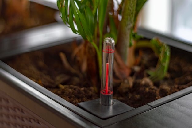 Close up of a smart sprinkler head with a soil moisture sensor inserted in the lawn, showcasing the technology integrated for efficient water management. The background is blurred, focusing on the sensor and sprinkler.