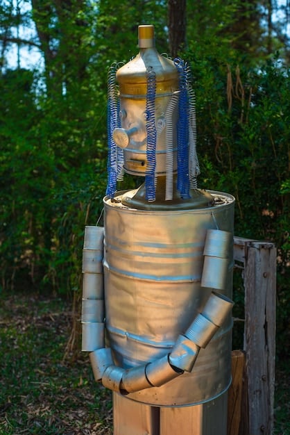 A detailed shot of the spigot and hose connection on a rain barrel, highlighting the hardware components and their assembly, demonstrating a crucial part of the DIY project.