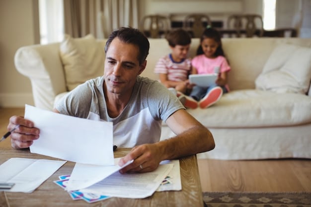 A close-up of a single father organizing receipts and documents related to childcare expenses, highlighting the importance of record-keeping for tax purposes.