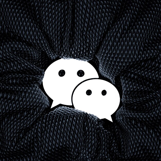 A digital art graphic showing two speech bubbles facing each other, with symbols of ears inside each bubble to represent 'listening' and hands clasped to represent 'agreement'. The background is a gradient of light blues, contributing to a peaceful and collaborative feel.