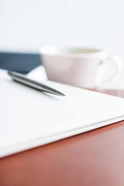 A close-up shot of legal documents related to child custody, with a pen resting on top. The background is a softly blurred image of a family.