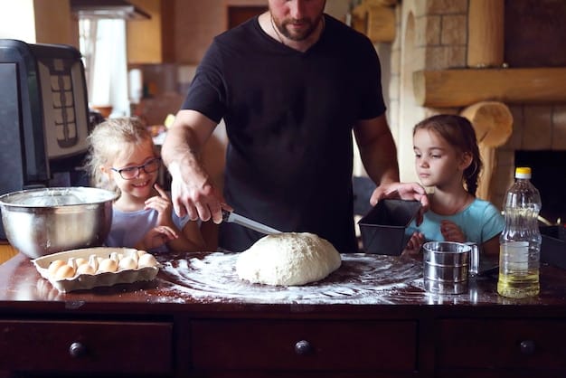 A father and his daughter, both smiling, are sitting at a kitchen counter rolling out pizza dough together. Flour dusts their hands and the counter, suggesting a fun, messy cooking session.