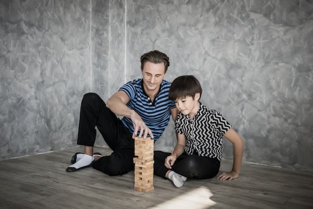 A candid photograph of a single father and his child laughing together while building a Lego structure on the floor, showcasing playful interaction and shared enjoyment.