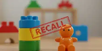 Recalled children's toy with a red recall stamp
